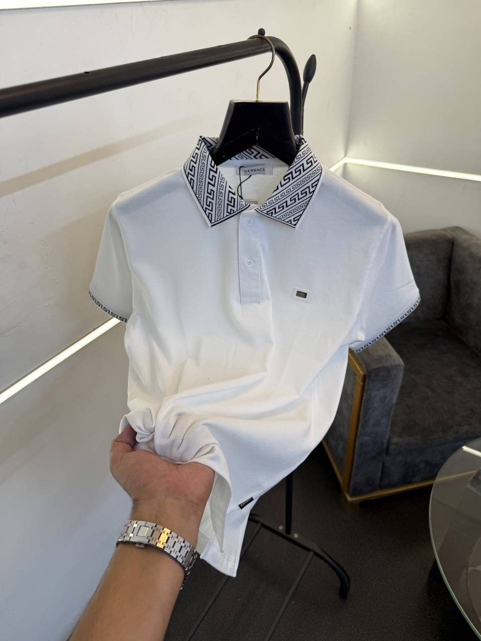 Versace white imported polo tshirt with brand buttons and knitted collar with sleeves
