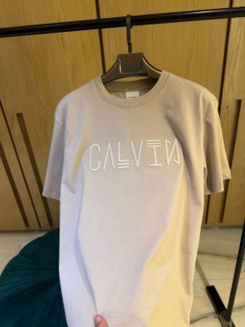 Calvi-xn Klei xIMPORTED STORE ARTICLE T-SHIRTx
