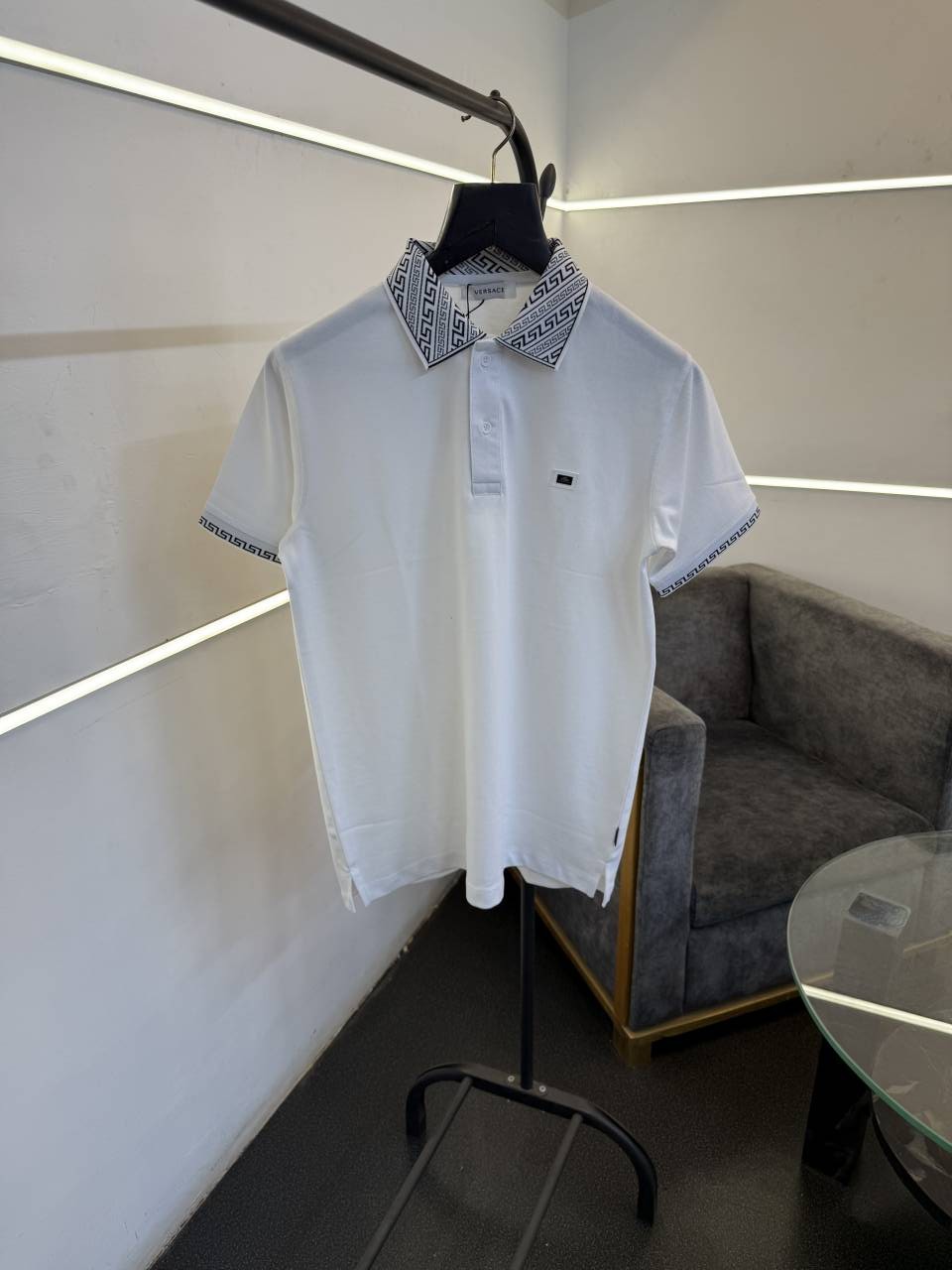 Versace white imported polo tshirt with brand buttons and knitted collar with sleeves