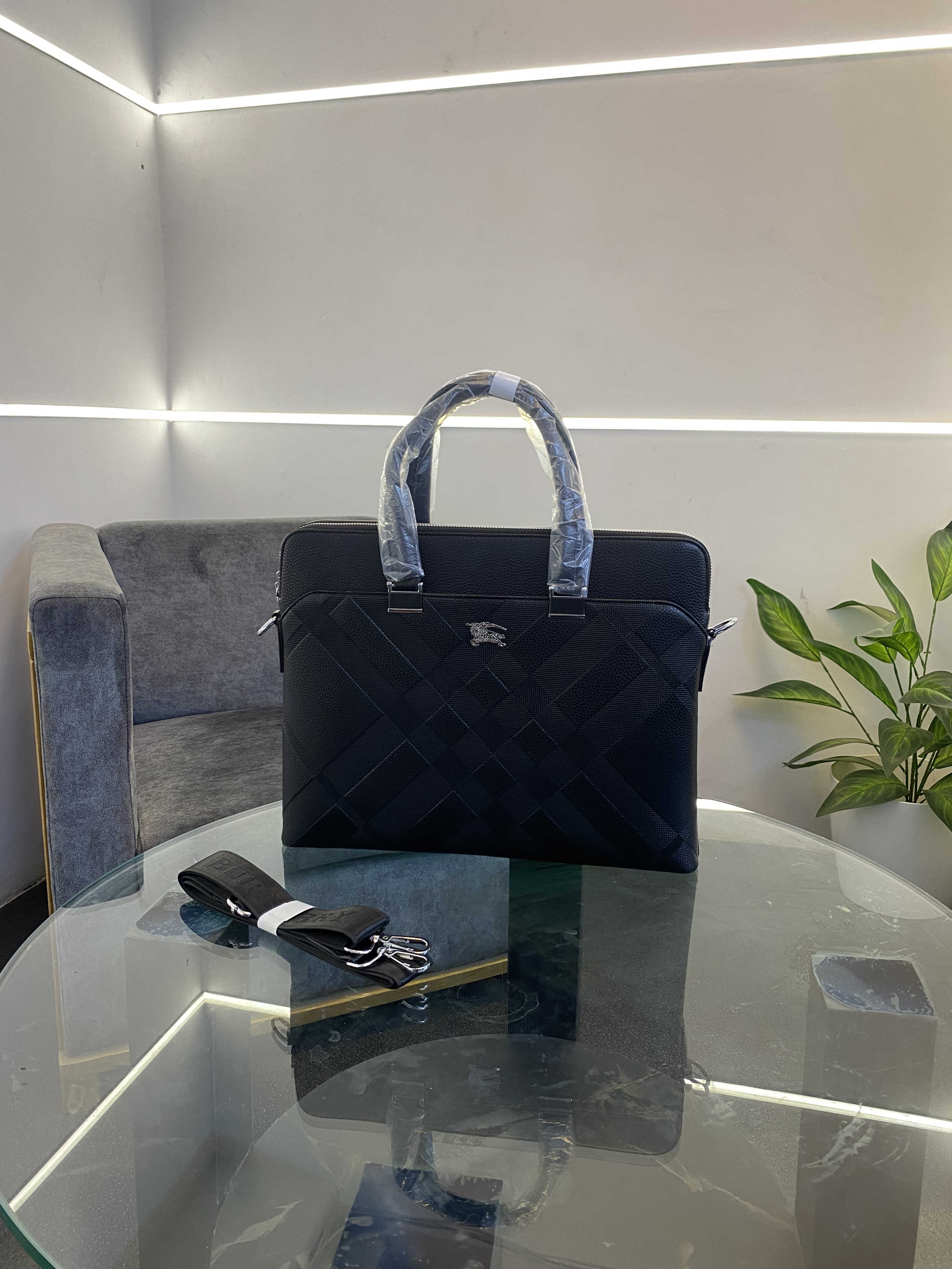 Burbery Imported leather laptop bag with front pocket double zip back zip and strap black