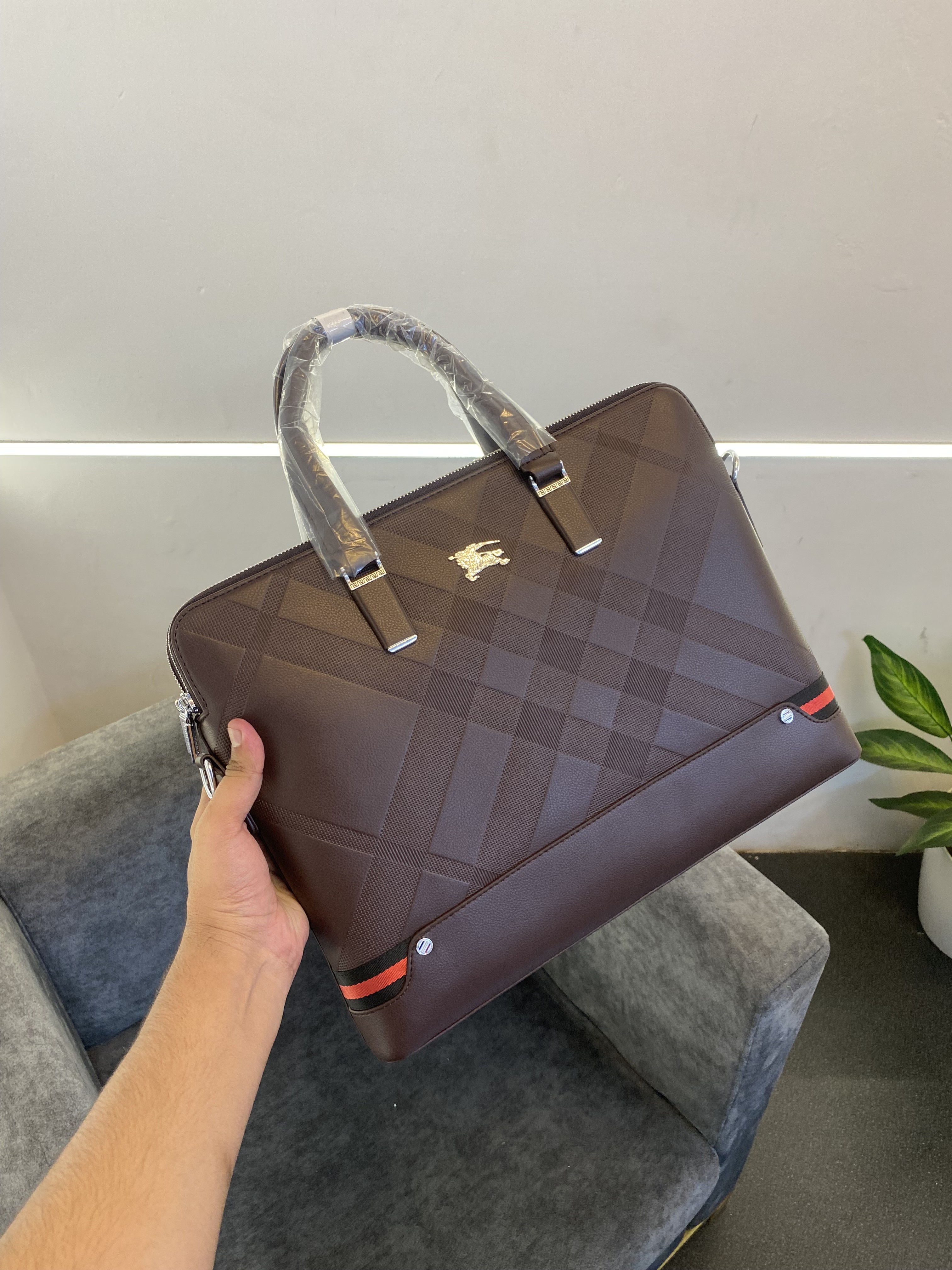 Burbery checks laptop bag with steel logo and starp grey brown