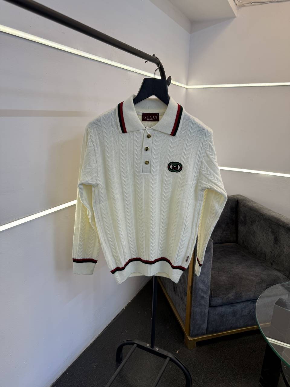 Gucci knitted imported sweatshirt with brand button and logo on chest cream